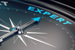 Image of a compass pointing to the word Expert. 