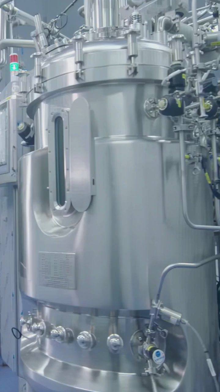 High-tech stainless steel industrial processing tank control panel in pharmaceutical factory that uses Ethyl Bromide in manufacturing.